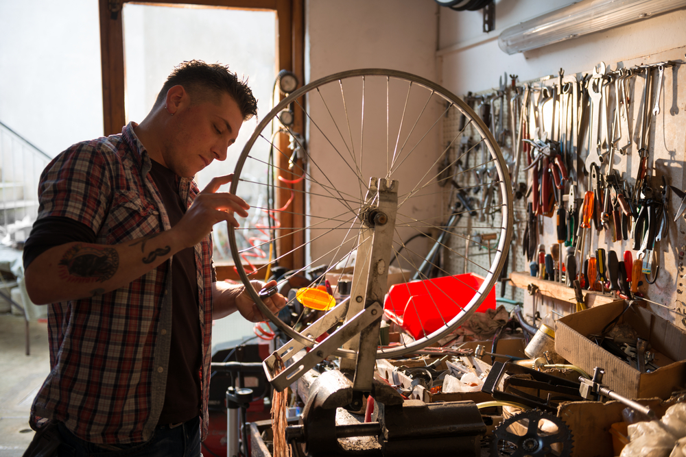 Man repairing bike